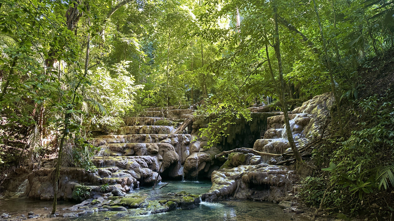 Natural pools and waterfalls along jungle path to Palenque museum